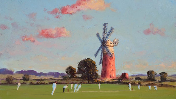A rural cricket match in the foreground with a windmill in the background and pink clouds gathering in the sky